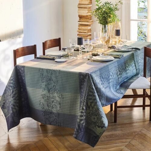 decorated table with linens and kitchenware